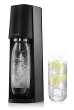 Black sparkling water maker with bottle dispensing fizzy water