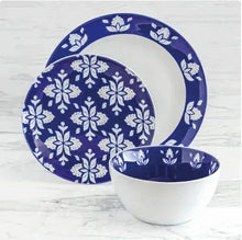 Indigo and white stoneware dinner plate and bowl with blue floral motif