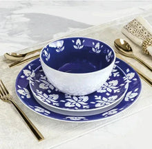 Indigo and white stoneware bowl set with floral trim and matching plate