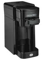 Black single-serve coffee maker with pod holder and drip tray