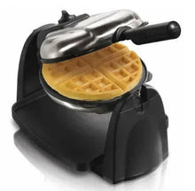 Flip waffle maker showing open top and golden waffle on non-stick plate