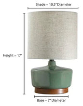 17 in ceramic table lamp with teal base, 10.5 in shade, 7 in diameter base.
