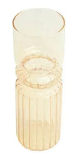 Iridescent amber glass vase with fluted sides and rounded open top