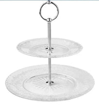 Two-tier clear glass server with embossed floral pattern and round metal support.