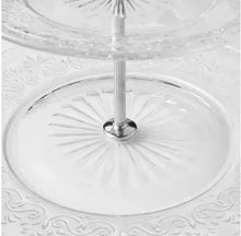 Two-tier glass server bottom plate with starburst embossing and vertical metal stem.