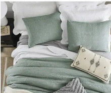 Sage comforter with textured floral look and two square pillows, plus small accent pillow
