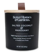 Black jar candle with brown wooden wick tab and front label