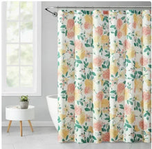 Floral shower curtain with pink rose, yellow blooms, and green leaves on white