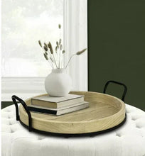 Round light wood tray with black metal loop handles