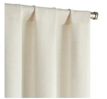 Beige textured light-filtering curtain panel with rod pocket top