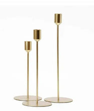 Gold metal tealight candle holders set of 3, three posts with round bases