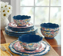 Stoneware dinnerware set with floral bowls, blue rims, and stacked dinner plates