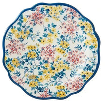 Floral stoneware dinner plate with blue scalloped rim and bouquet pattern