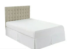 Cotton bed skirt, bright white, with fitted corners and neat pleated trim
