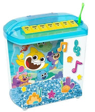 Educational betta fish tank with blue lid, shark-themed art, and blue gravel base