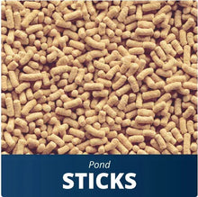 Fish food sticks pile, light tan pellets