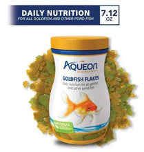 Goldfish flakes container by Aqueon, orange cap, blue band, jar with gold flakes