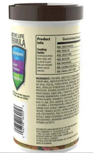 TetraMin XL tropical fish food flakes jar with back product info label