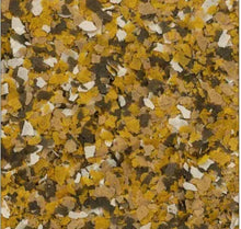 Tropical fish flake food, yellow and dark flake mix texture