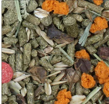 Rabbit food pellet and flake mix with green, orange, and dark pieces