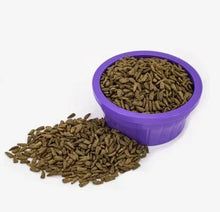 Rabbit feed pellets in purple scoop
