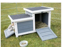 Gray elevated small animal house with open hinged roof and side access ramp