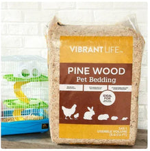 Pine wood pet bedding bag with front label and animal icons