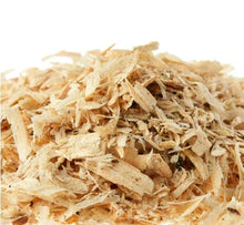 Pine wood pet bedding, shredded wood pieces in light tan