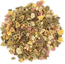 Mixed hamster food pellets and bits in green, yellow, brown, and pink pieces