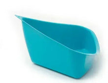 Turquoise corner litter pan with slanted interior and rounded rim