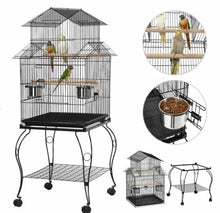 Black metal bird cage on wheeled stand with triple roof, perches, bowls, and door