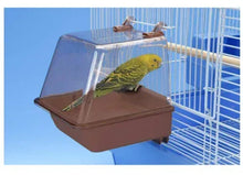 Brown clip-on bird bath mounted on cage bars with clear top