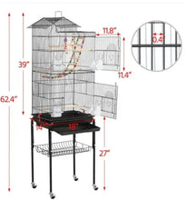 Black metal bird cage on wheeled stand with slide-out base tray