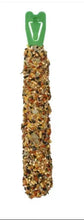 Crunchy seed-covered bird treat stick.
