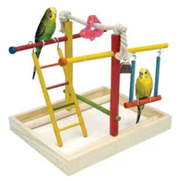 Wood bird playpen with colorful ladders, perches, hanging swings, and two yellow birds
