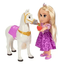 Toddler princess doll in purple satin dress holding a white pony with purple saddle