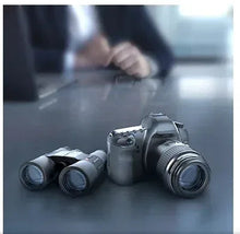 Lens wipes with camera lenses shown on a tabletop