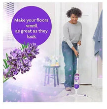Lavender floor power mop in use with scent bottle