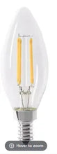 Soft white LED candelabra bulb with clear glass and two vertical filament LEDs