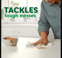 Paper towels sheet being wiped on a counter for spills and messes