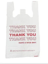 White T-shirt carry-out plastic bag with red "THANK YOU" text and handles