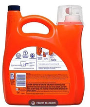 Orange liquid laundry detergent bottle with blue label and pull-handle cutout