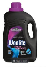 Woolite Darks Defense laundry detergent bottle with purple cap, dark label