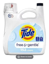 Laundry detergent jug with blue cap and Free & Gentle front label