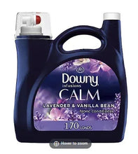 Liquid fabric conditioner bottle with purple lavender graphic, Downy Calm label