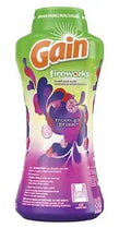 Scent booster beads container with green cap and purple fireworks graphics