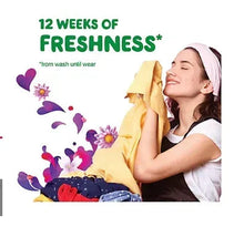 Scent booster beads label graphic with “12 weeks of freshness” and woman with towel