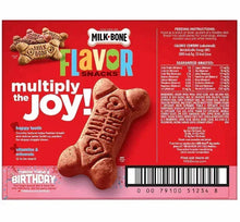 Red package of small dog biscuits with crunchy bone-shaped treats