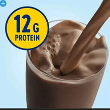 Chocolate protein shake in a cup with a 12g protein badge and spoon