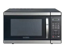 Black + Decker microwave oven with stainless steel trim and keypad panel